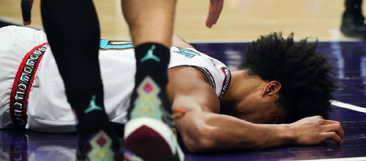 Jalen Wells was injured during the game and was carried off the court on a stretcher after falling.