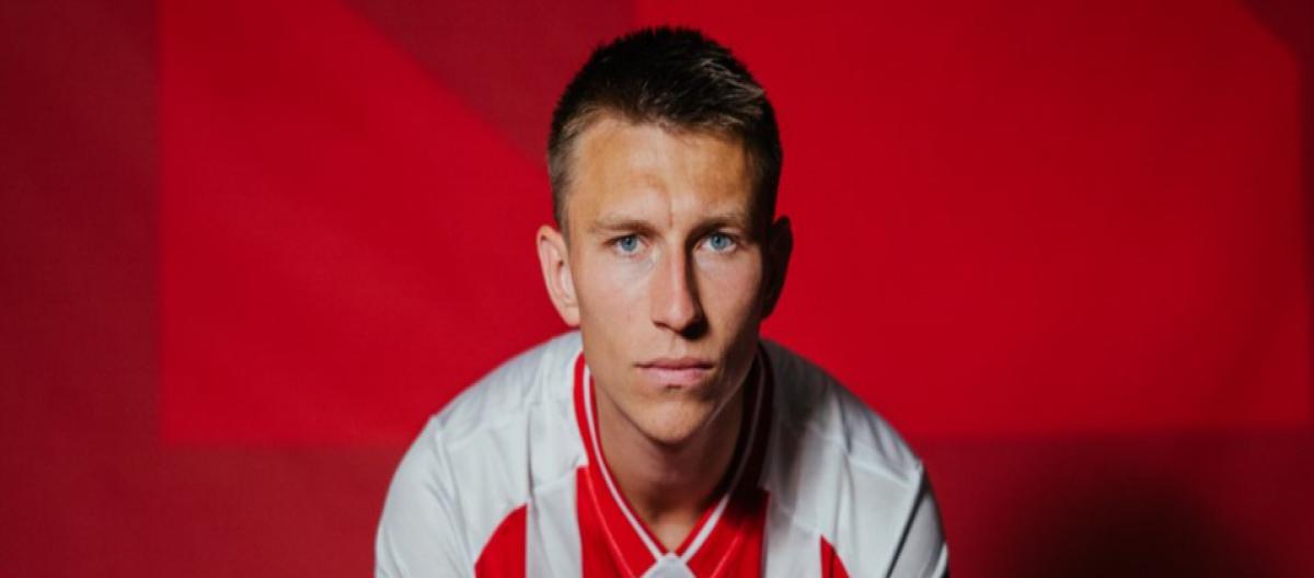 Palermo left-back Christopher Lund joins Cologne on loan and will wear the number 32 jersey