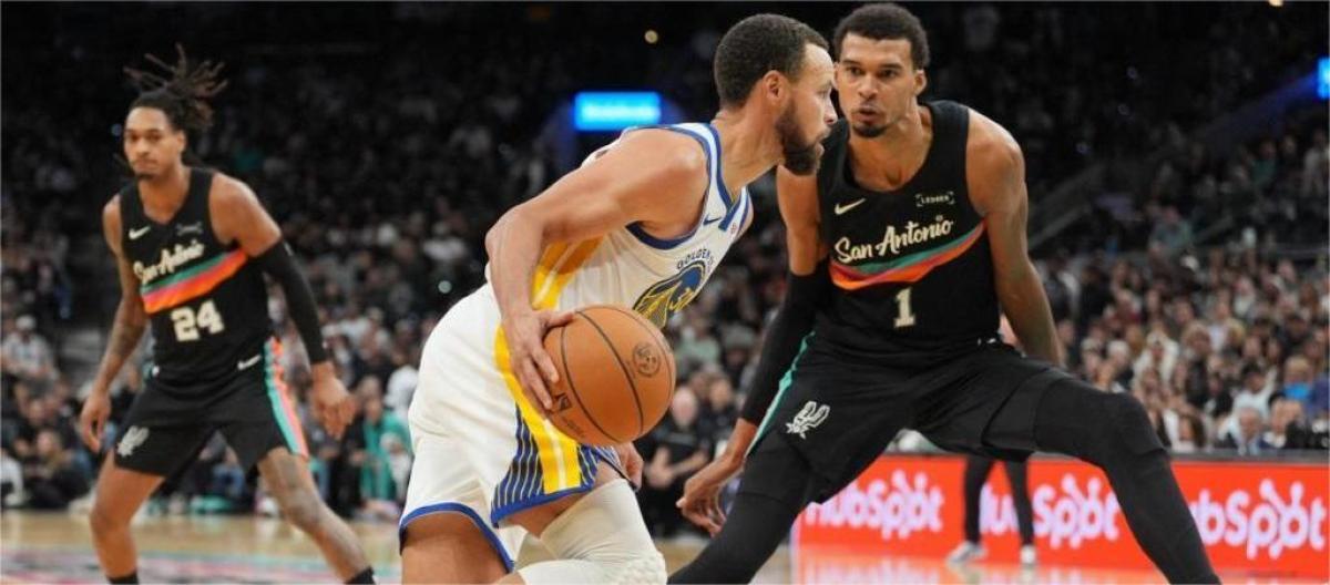 Stephen Curry scored 46 points as the Golden State Warriors defeated the San Antonio Spurs 125-120.