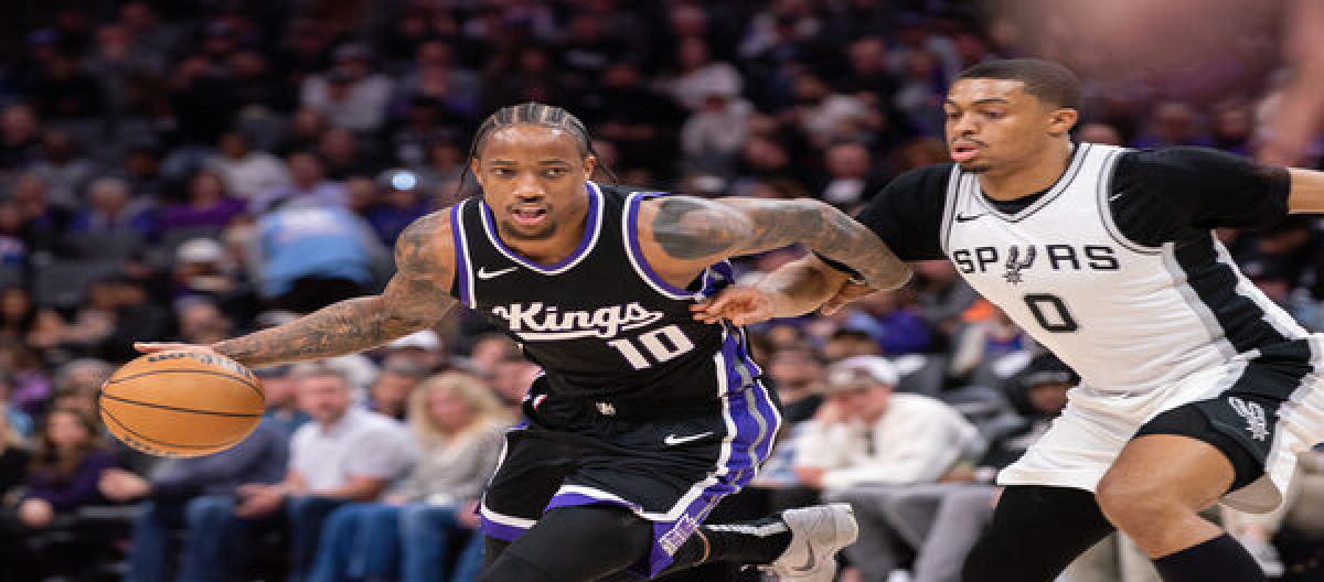 DeRozan and Murray combined for 59 points as the Kings narrowly defeated the Timberwolves 117-112 in overtime.
