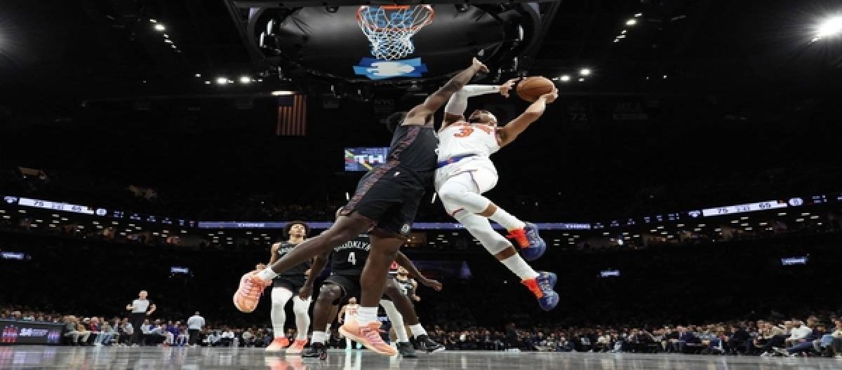 Karl-Anthony Towns' 37 points and 12 rebounds led the Knicks to a 113-100 victory over the Nets.