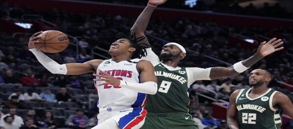 Porter scored 26 points while Giannis Antetokounmpo was injured, and the Bucks narrowly defeated the Pistons 113-109.