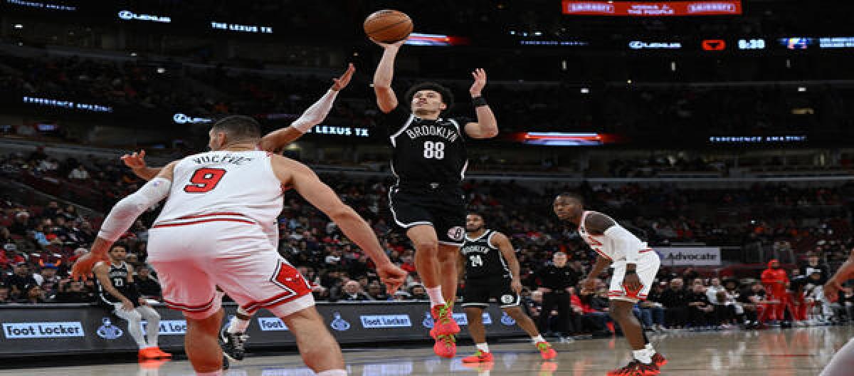 White scored 24 points and Dossam added 19 as the Bulls defeated the Nets 124-102.