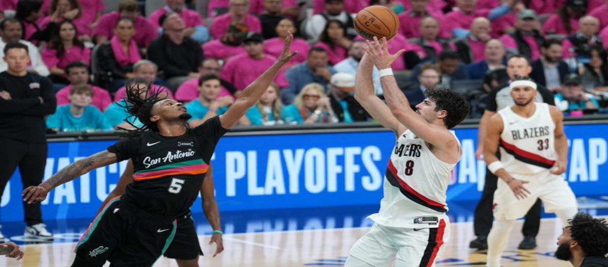 Wimbledon and Yama scored 35 points, leading the Spurs to a 111-98 victory over the Trail Blazers.