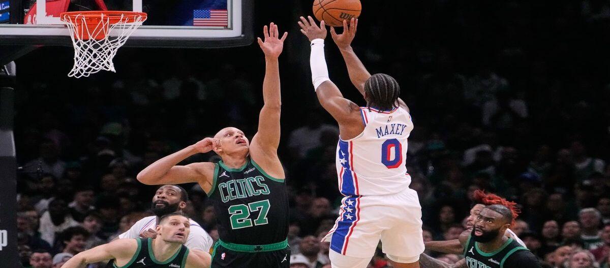 Embiid's 33 points helped the 76ers stage a 113-97 comeback to defeat the Celtics.