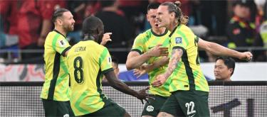 Popovich hopes Australia can reach the World Cup finals after defeating China 2-0