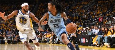 Golden State Warriors beat Memphis Grizzlies 121-116 to advance to playoffs