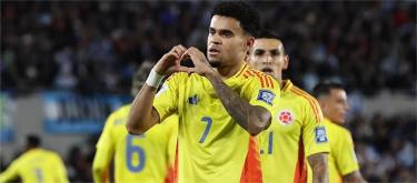World Cup qualifiers - Enzo is shown a red card as Argentina draws 1-1 with Colombia