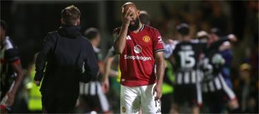 English League Cup - Manchester United were eliminated after losing 11-12 to Grimsby Town on penalties.