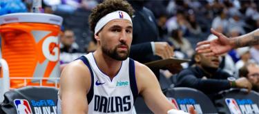 Klay Thompson hopes to be a role model for young players and aims to win a championship with the Mavericks