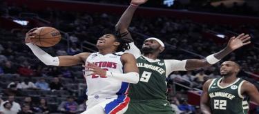 Porter scored 26 points while Giannis Antetokounmpo was injured, and the Bucks narrowly defeated the Pistons 113-109.