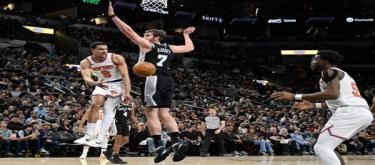 Champany scored 36 points as the Spurs narrowly defeated the Knicks 134-132.