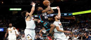 Jokic's 29 points weren't enough to save the Grizzlies from a 125-118 victory over the Nuggets.