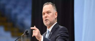 Michael Malone has officially switched to the NCAA, being hired as the head coach of the University of North Carolina men's basketball team.